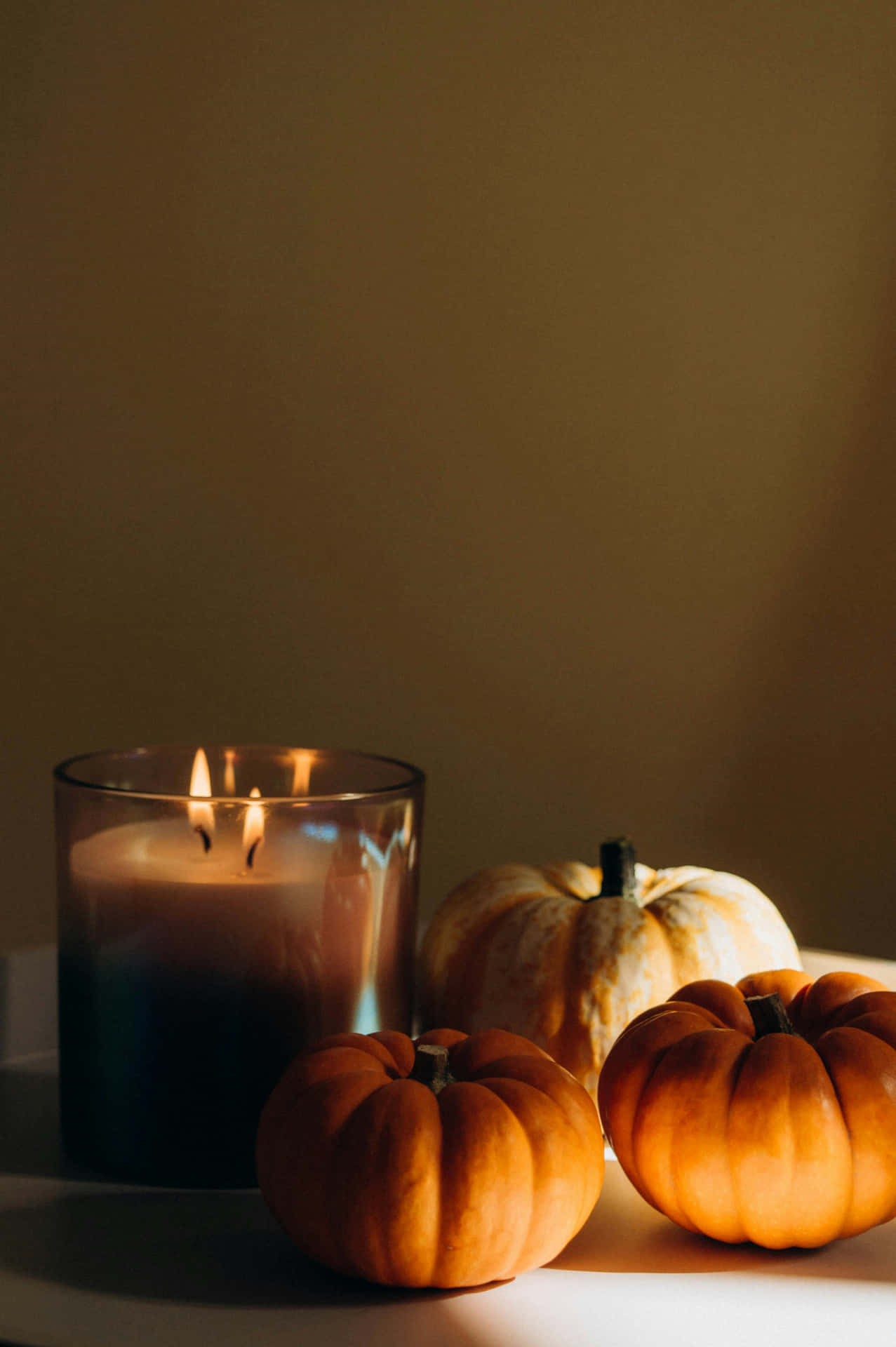 Autumn Pumpkin Candle Still Life Background