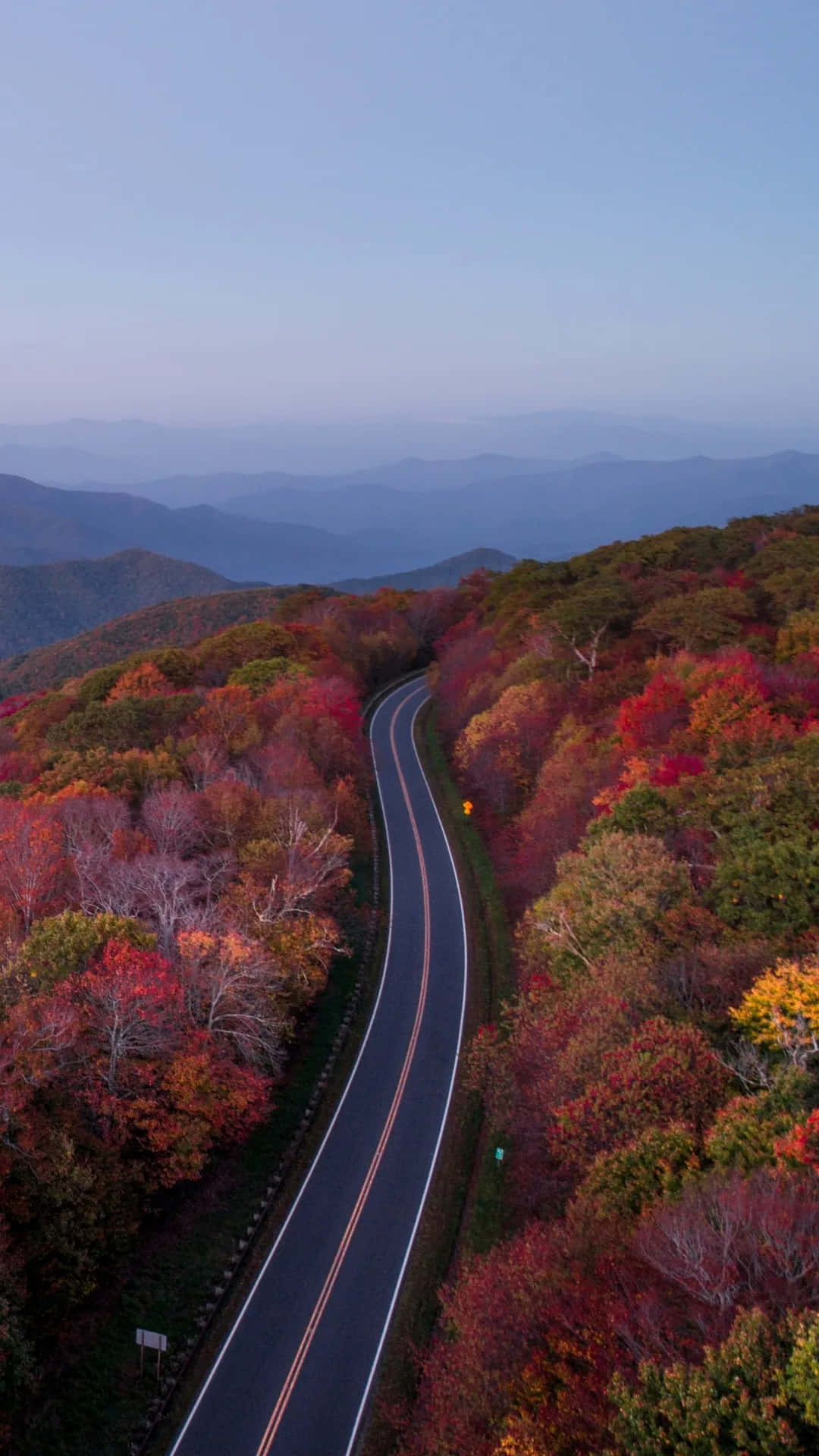 Autumnal Mountain Roadscape Background