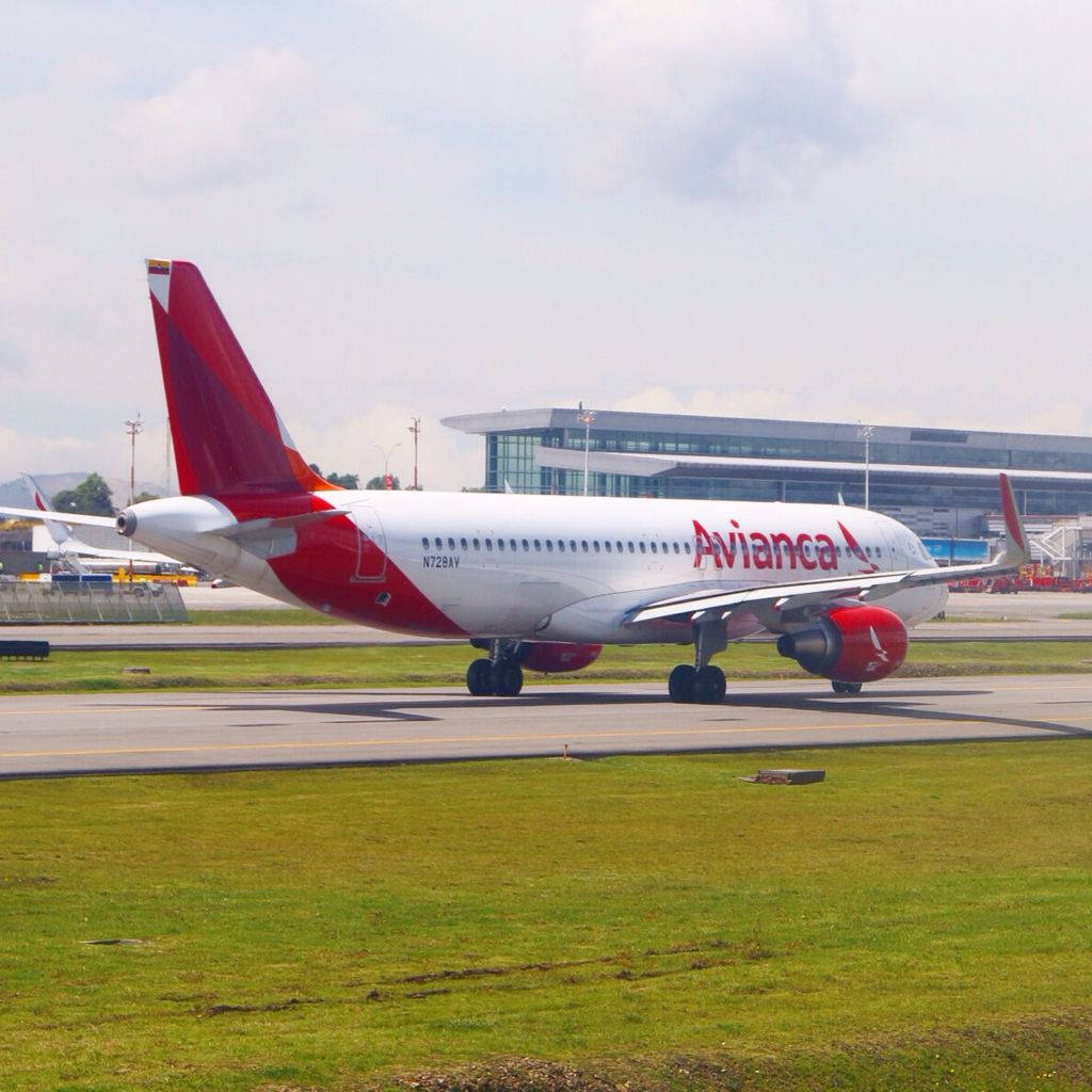 Avianca Airbus A320 Aircraft On Runway Background