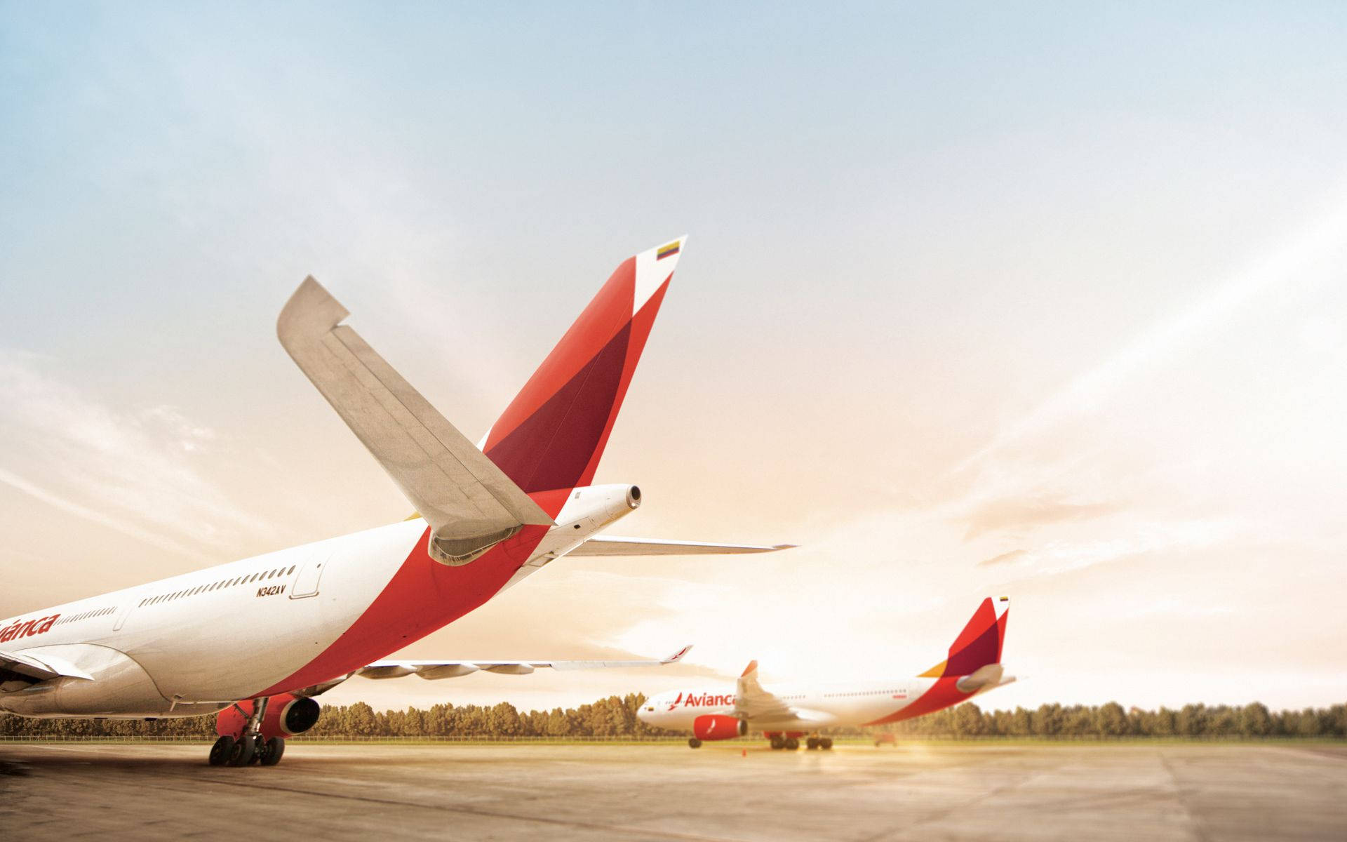 Avianca Airline Planes At Sunset Background