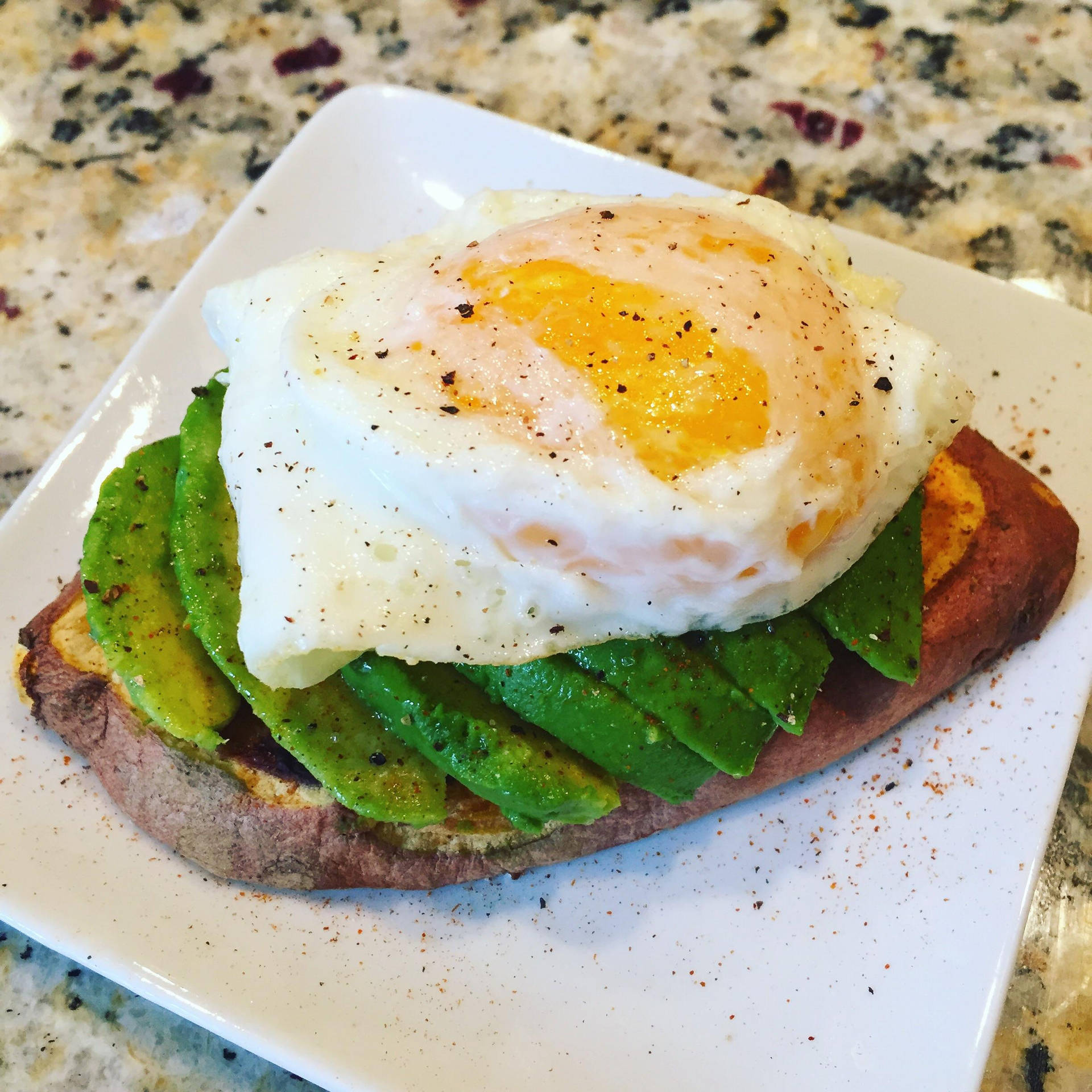 Avocado Toast Topped With A Poached Egg Background