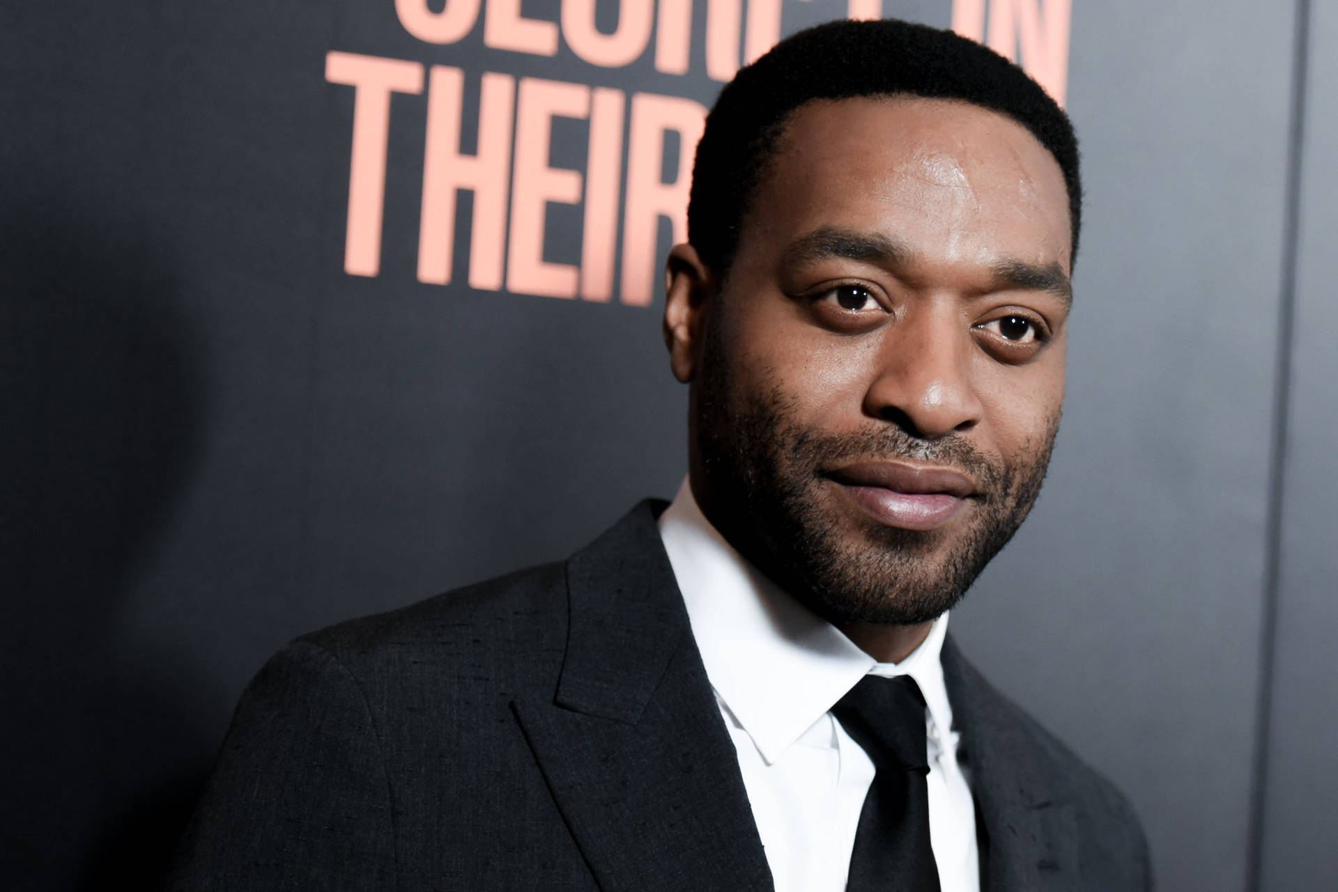 Award-winning Actor Chiwetel Ejiofor In A Movie Scene Background