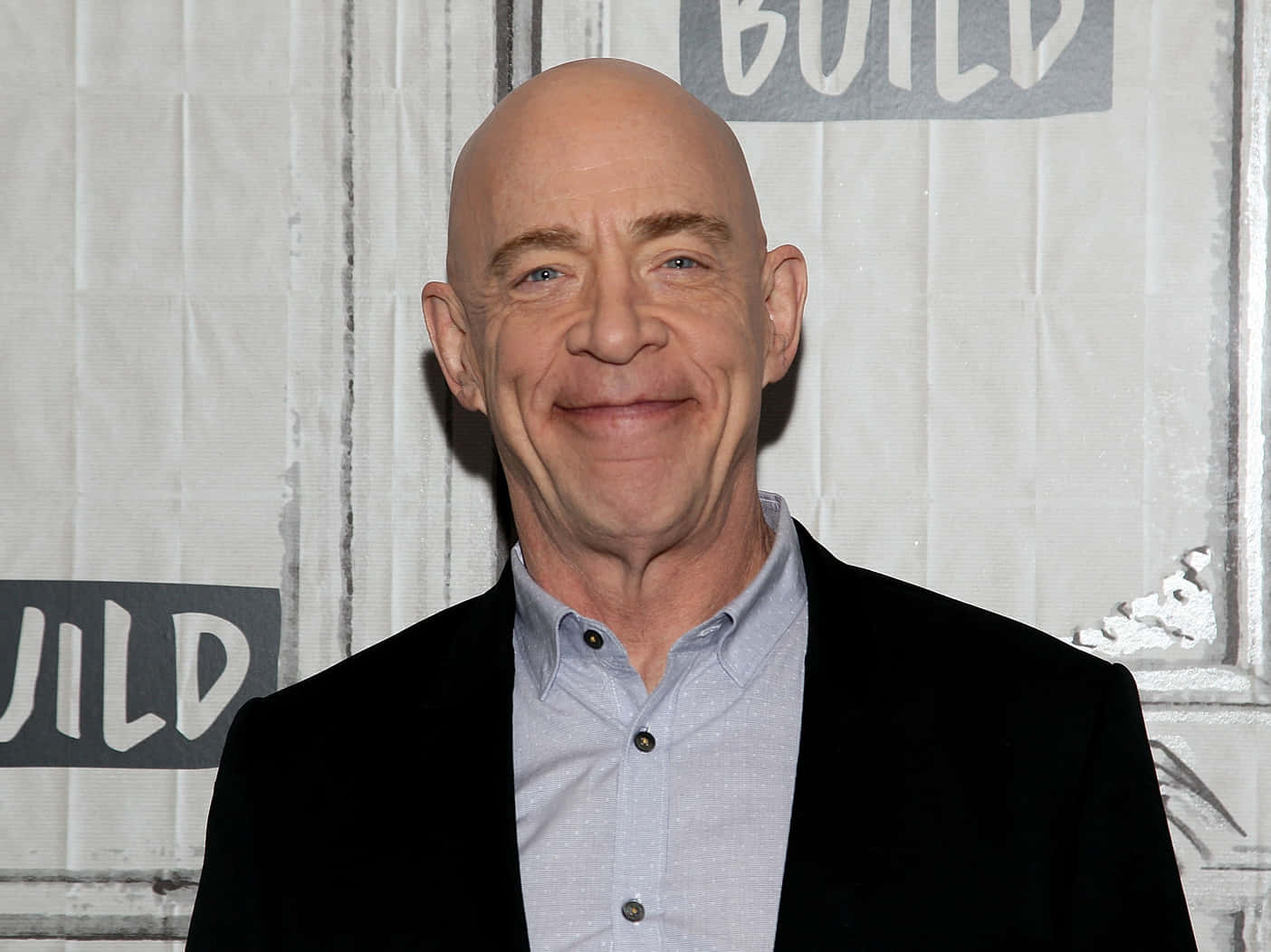 Award-winning Actor J.k. Simmons In A Poised Stance. Background