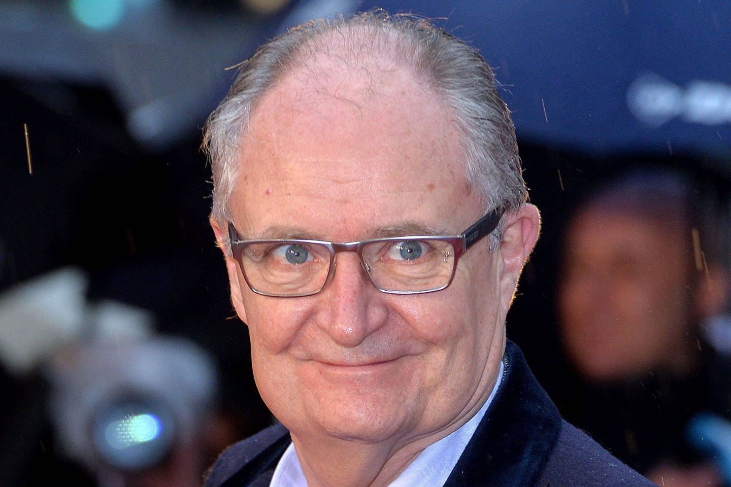 Award-winning Actor, Jim Broadbent, In A Sophisticated Pose. Background