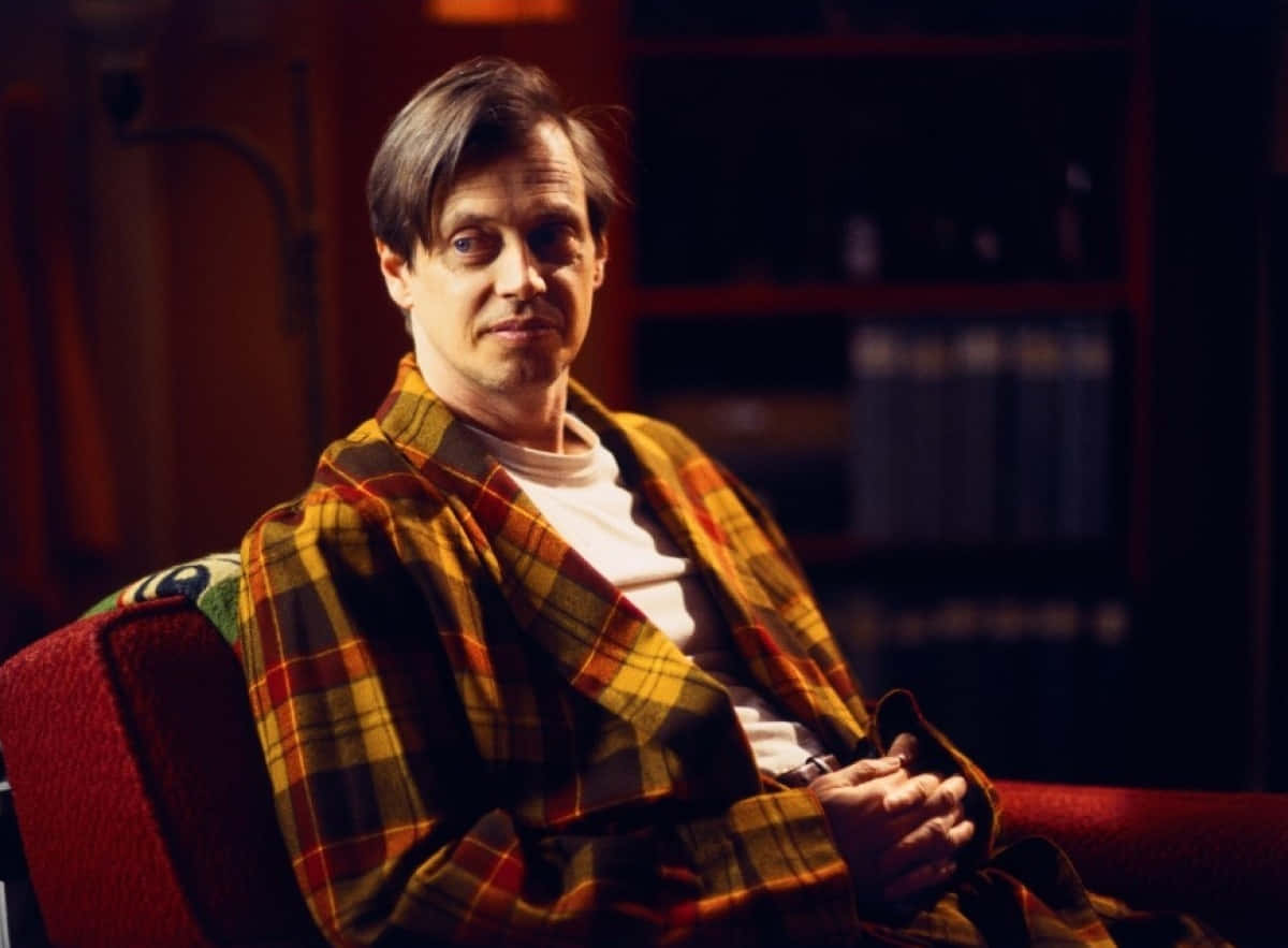 Award-winning Actor Steve Buscemi With A Thoughtful Pose. Background
