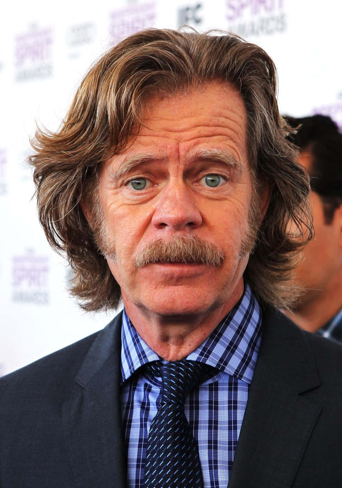 Award-winning Actor William H. Macy Posing For A Portrait Background