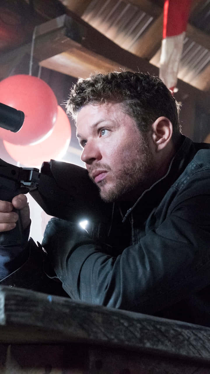 Award Winning American Actor, Ryan Phillippe Captured In A Thought-provoking Candid Moment Background