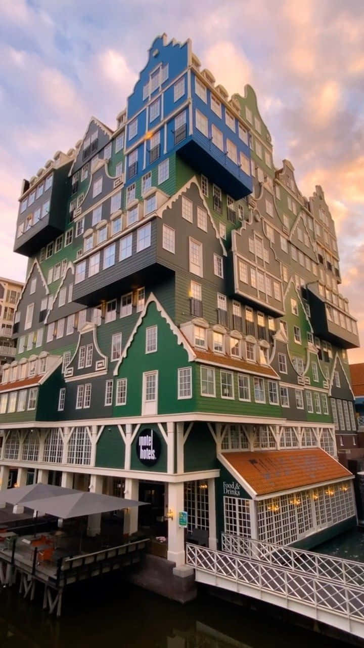 Awe-inspiring View Of Inntel Hotel, Zaandam Under A Dreamy Sky. Background