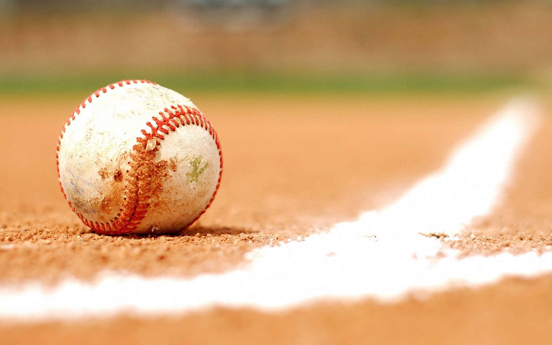 Awesome Baseball On Ground Background