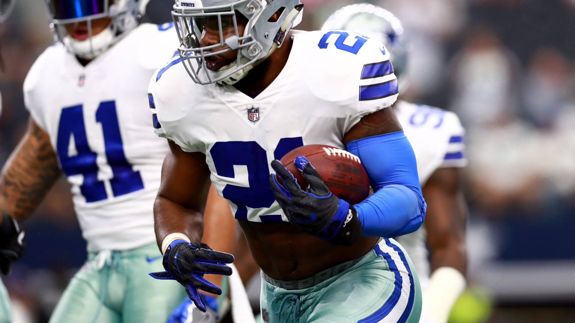 Awesome Dallas Cowboys Holding A Ball