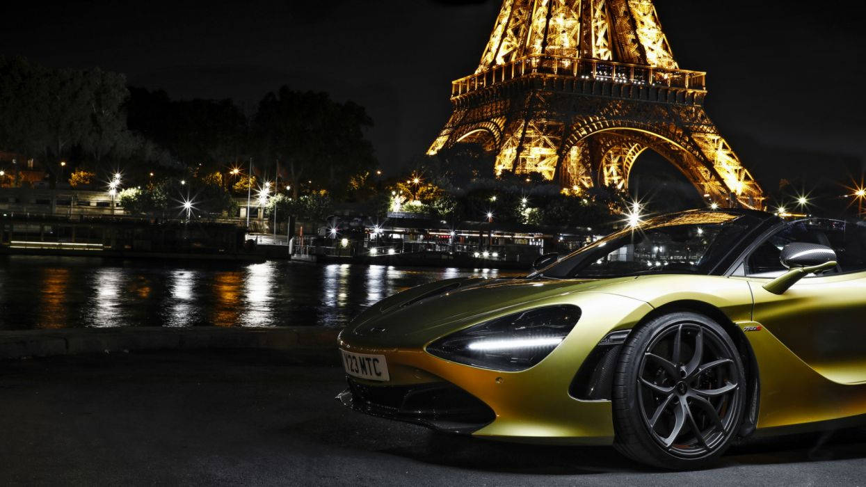 Awesome Gold Mclaren Spyder In Paris Background