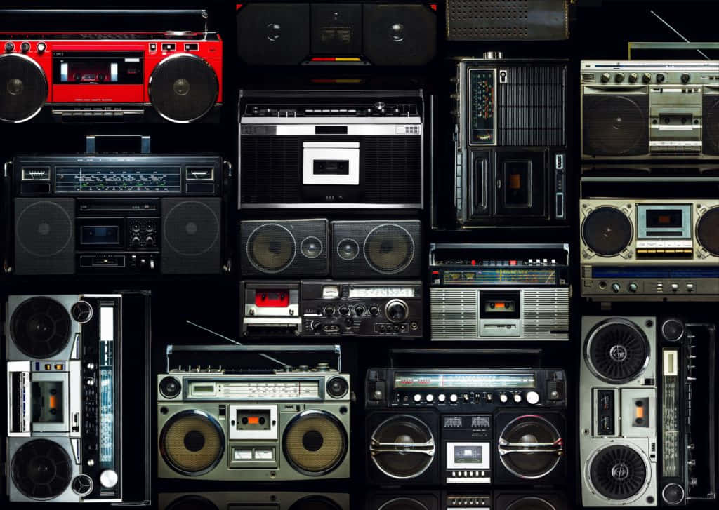 Awesome Wall Of Vintage Boombox Background