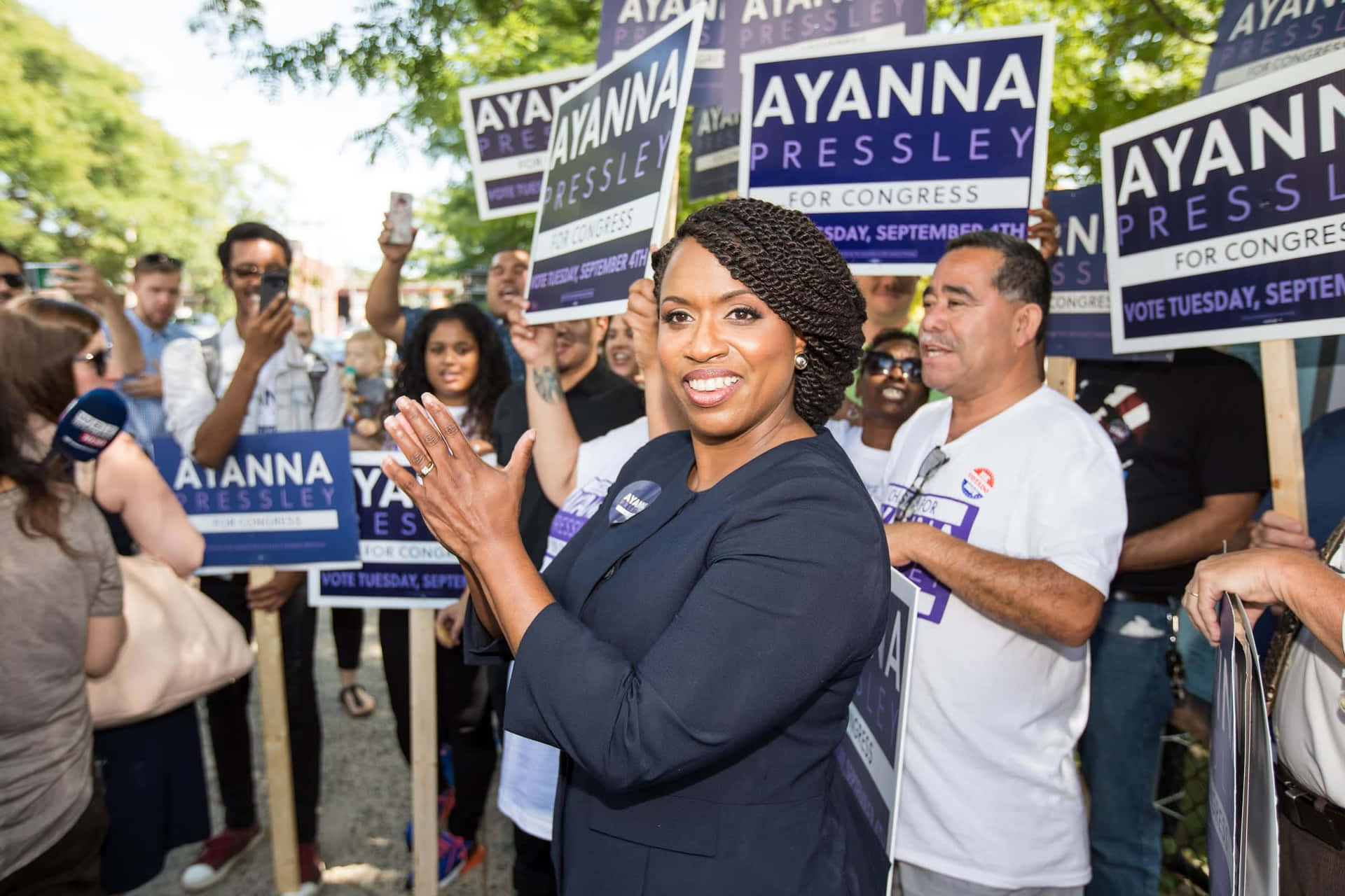 Ayanna Pressley At A Campaign Stop Background