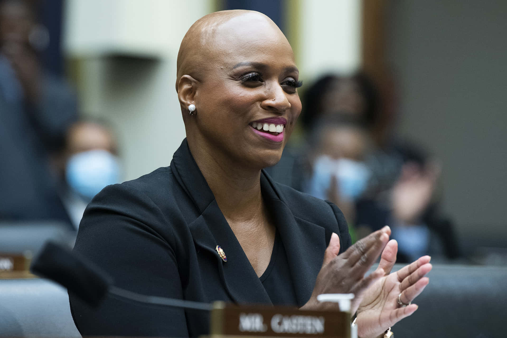 Ayanna Pressley Happily Clapping Hands Background
