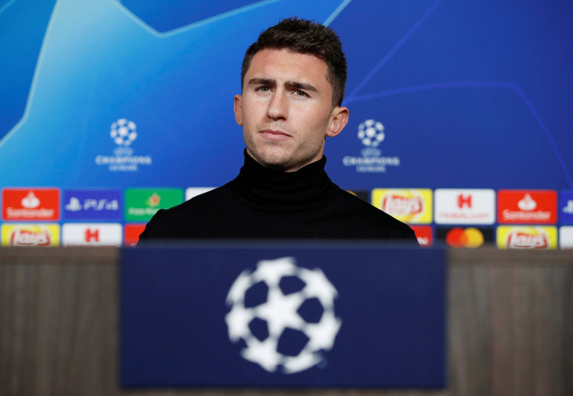 Aymeric Laporte At A Press Conference Background