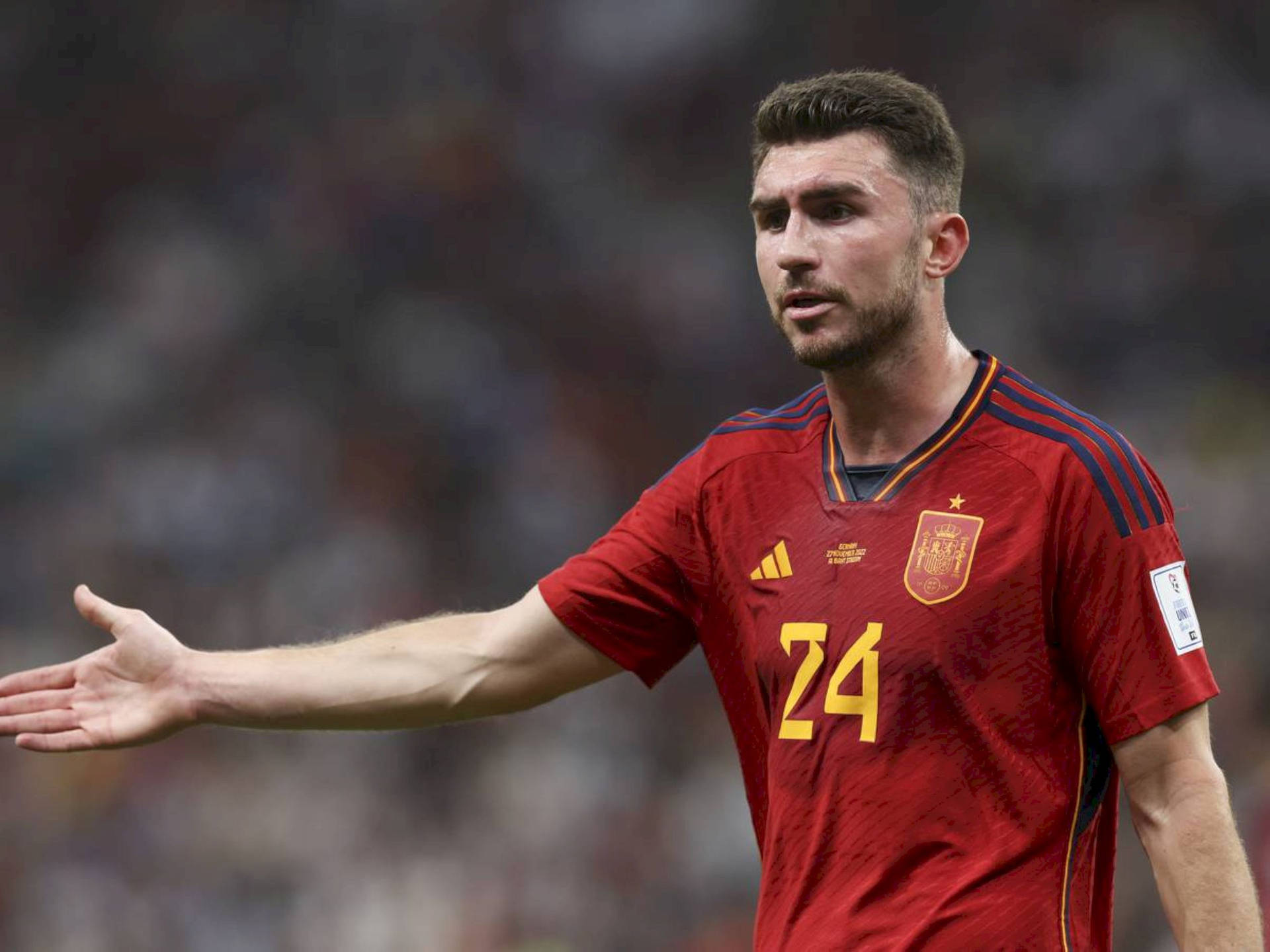 Aymeric Laporte Gesturing With Arm Background