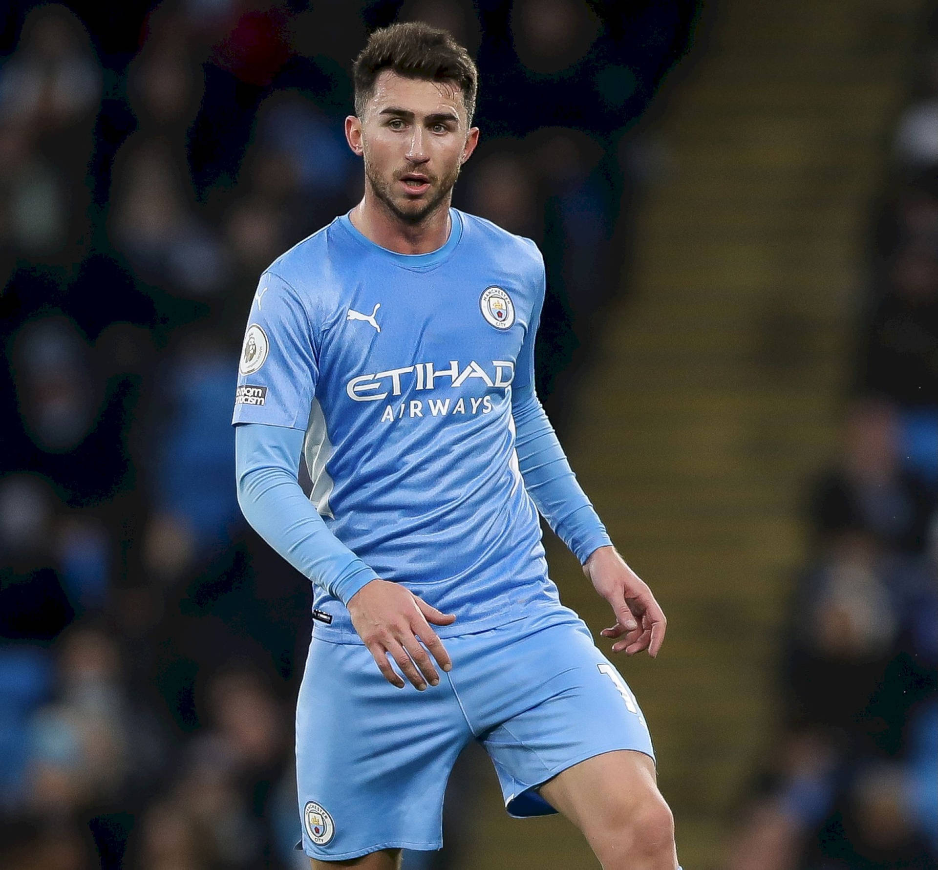 Aymeric Laporte In Light Blue Uniform Background