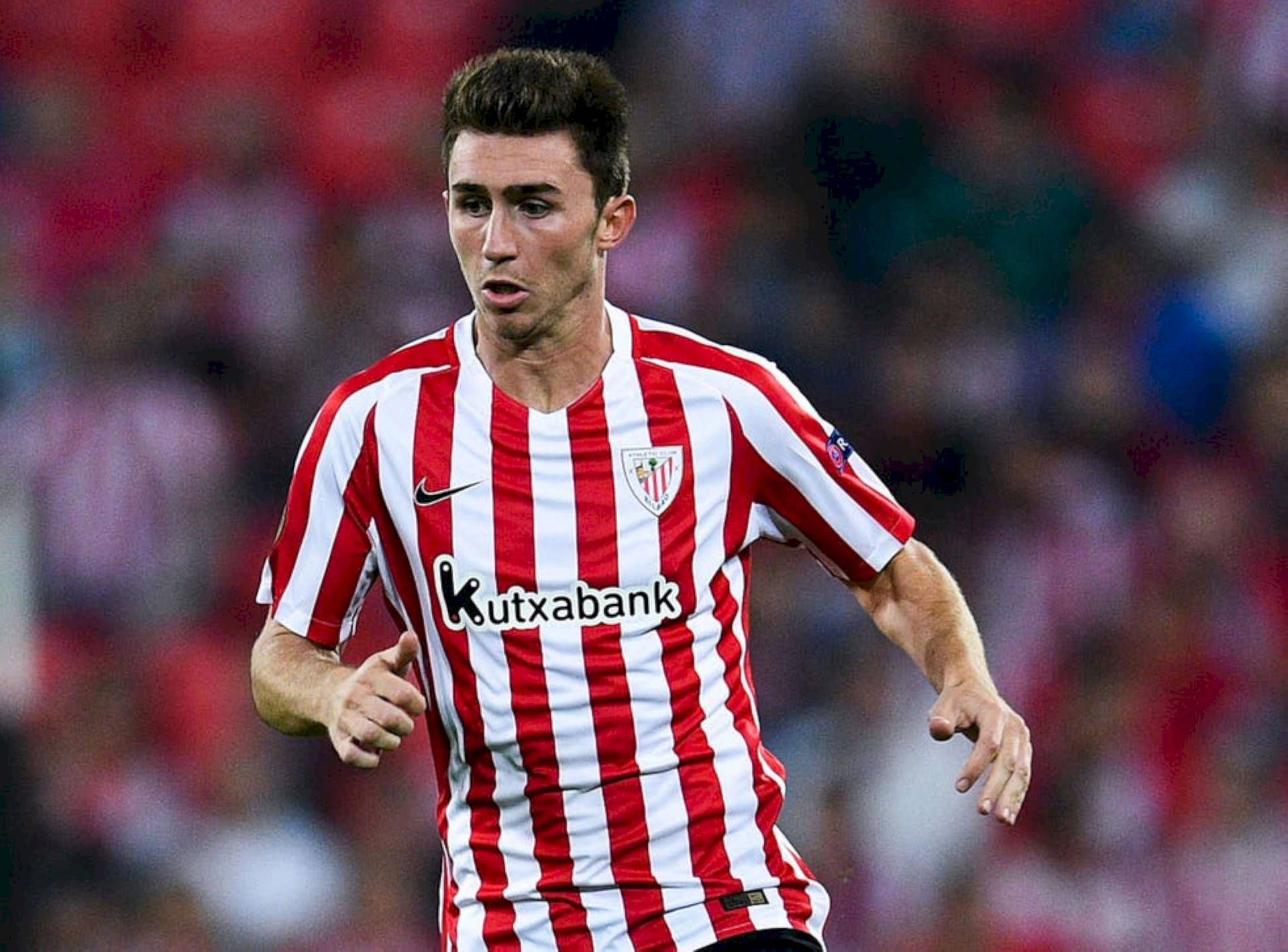 Aymeric Laporte In Striped Jersey Background