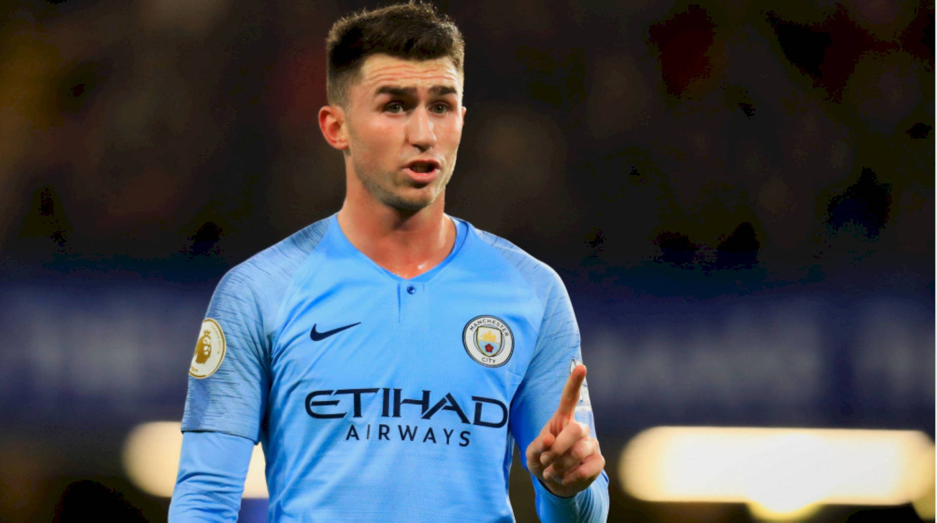 Aymeric Laporte Pointing His Finger Background