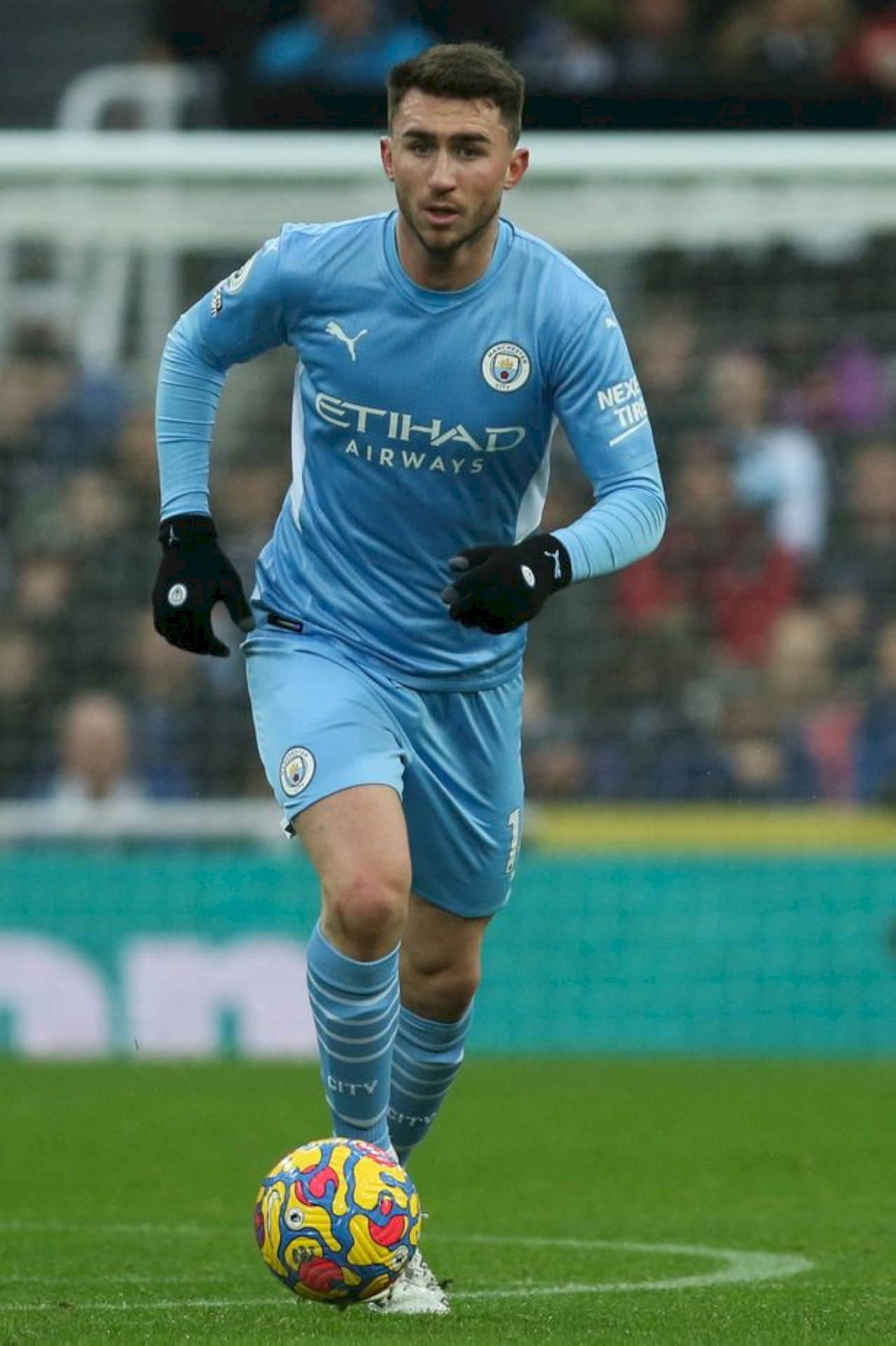 Aymeric Laporte Running With Football Background