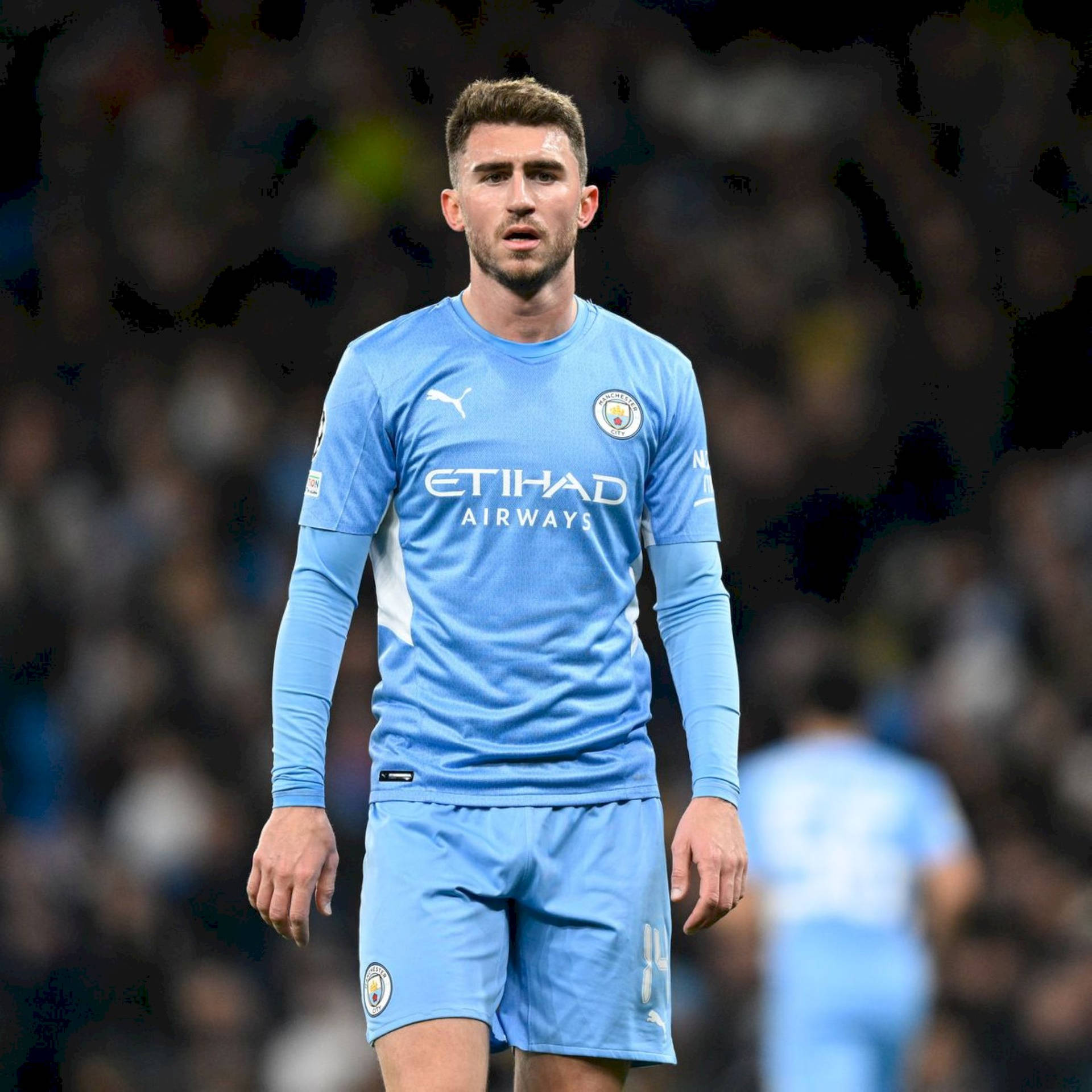 Aymeric Laporte Wearing Blue Background