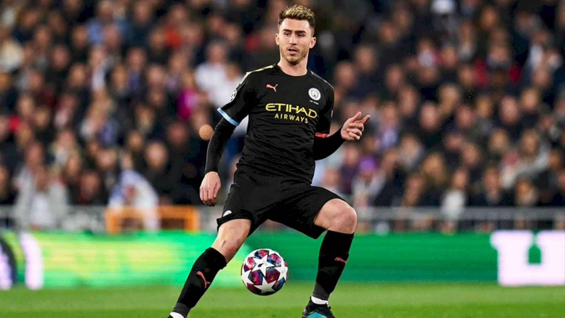 Aymeric Laporte With Football Between Legs Background