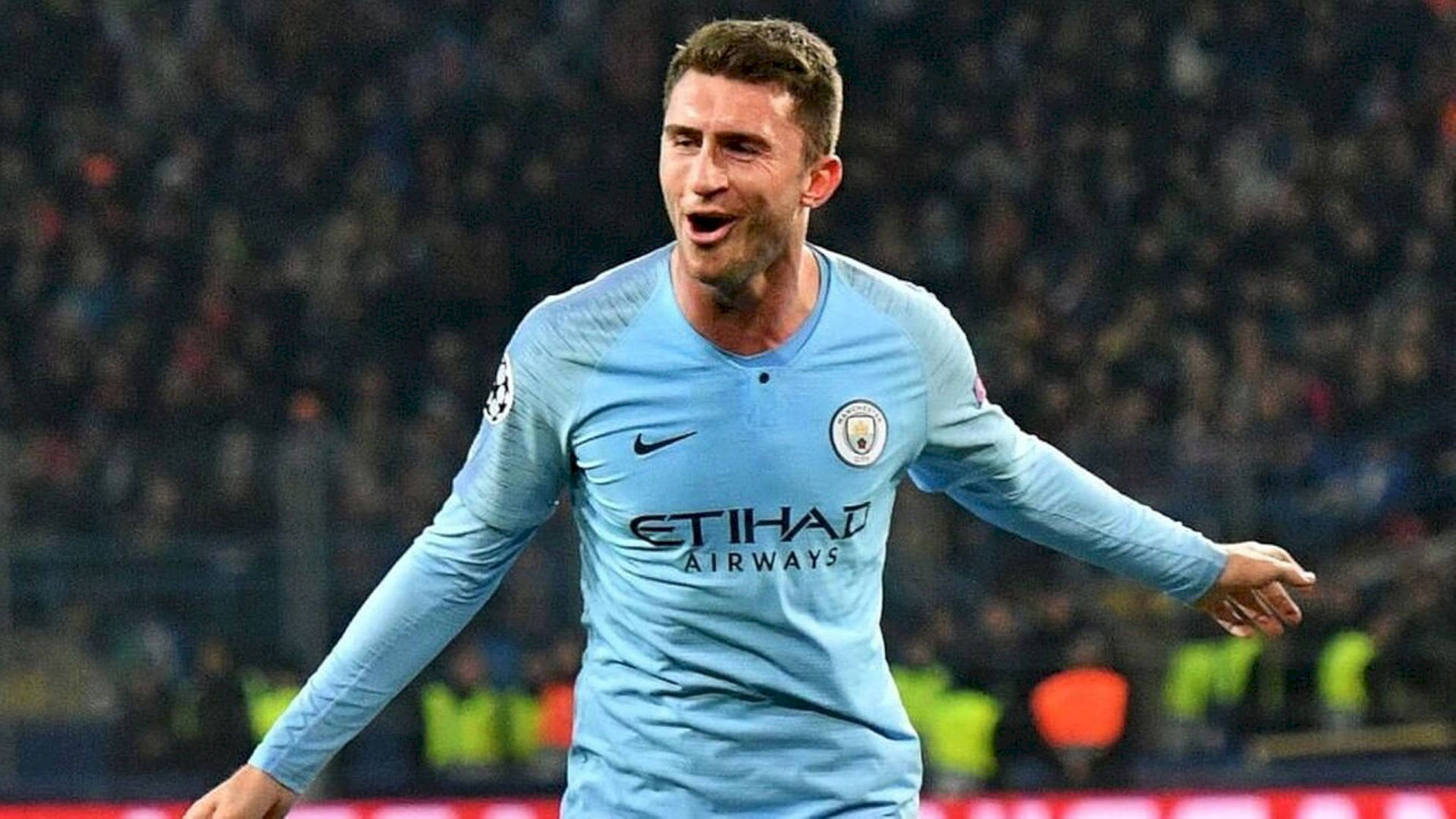 Aymeric Laporte With Light Blue Sleeves Background