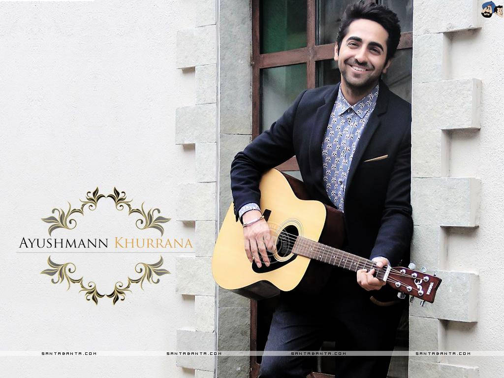 Ayushmann Khurrana In A Captivating Pose Background