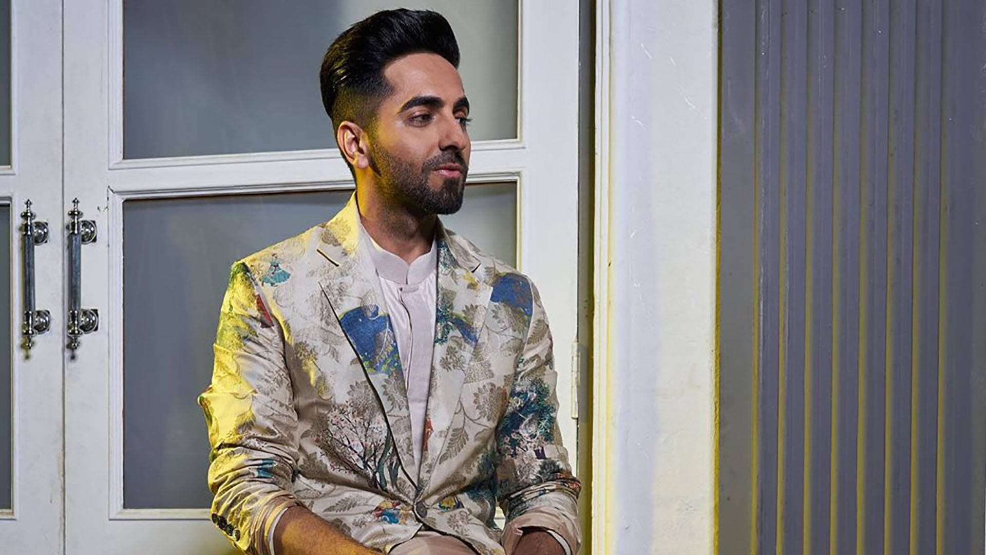 Ayushmann Khurrana In Floral Suit Background