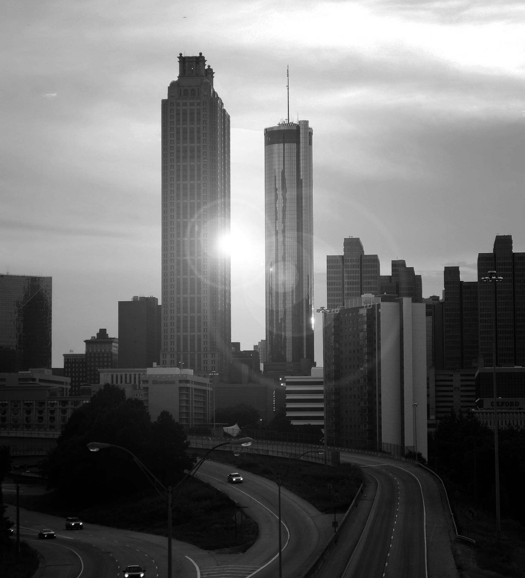 B&w Atlanta Skyline With Sunrays Background