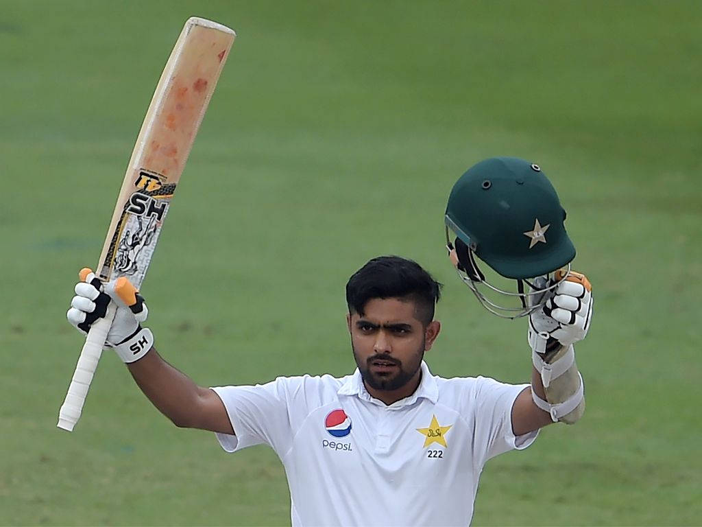 Babar Azam Celebrating With His Cricket Bat Background