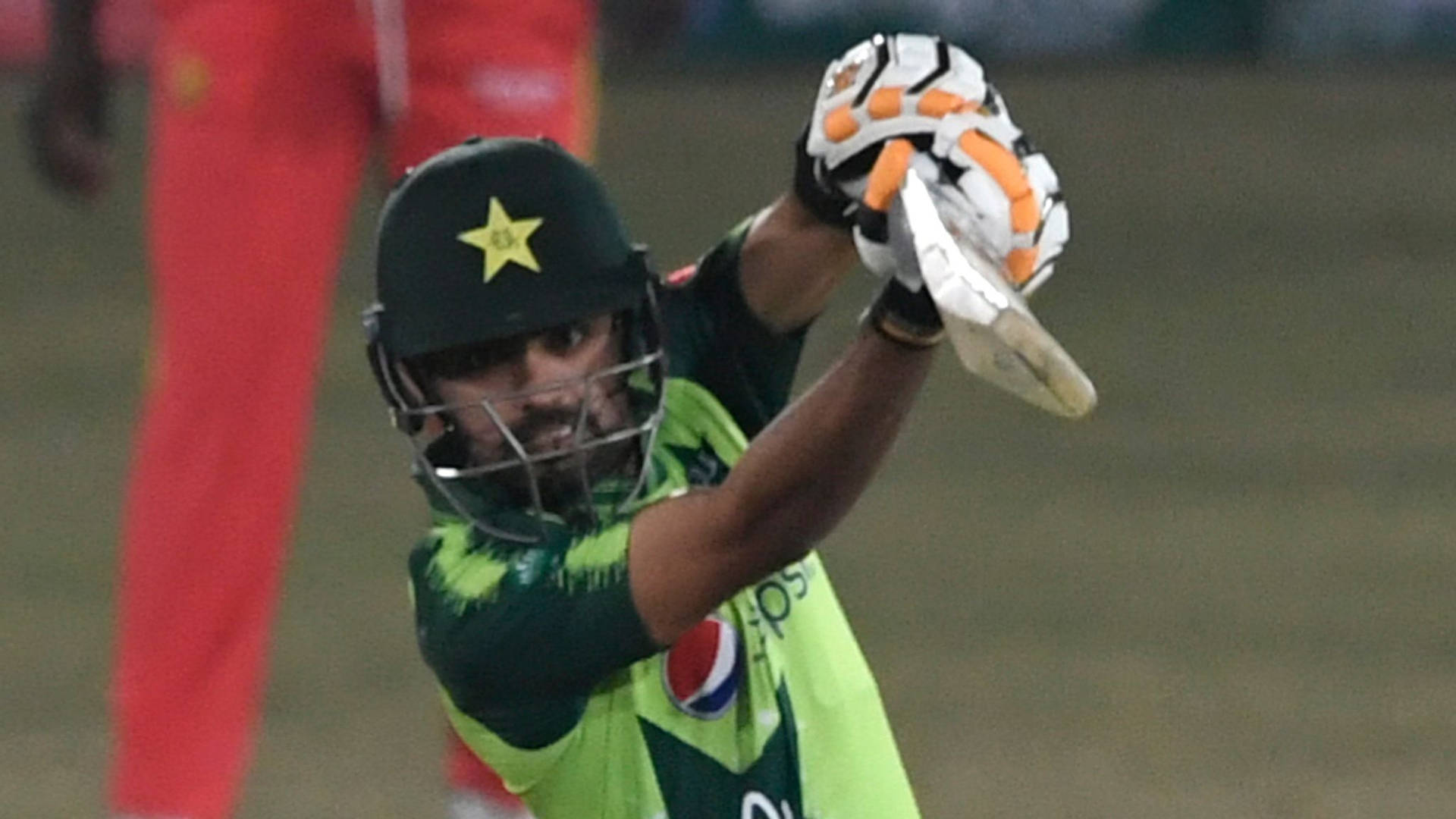 Babar Azam In Action - Displaying Top-notch Cricketing Skills Background