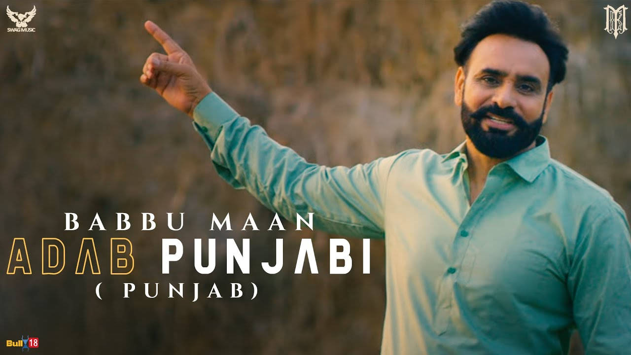 Babbu Maan On Stage During A Concert Background