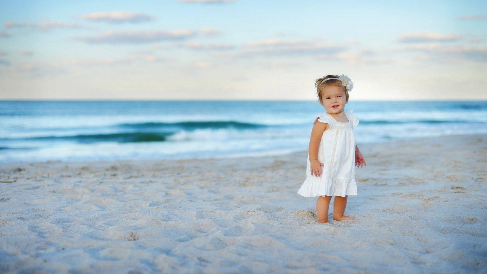 Baby Beach Girl In White Dress Background