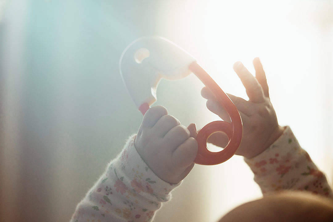 Baby Boy Playing With Toy Background