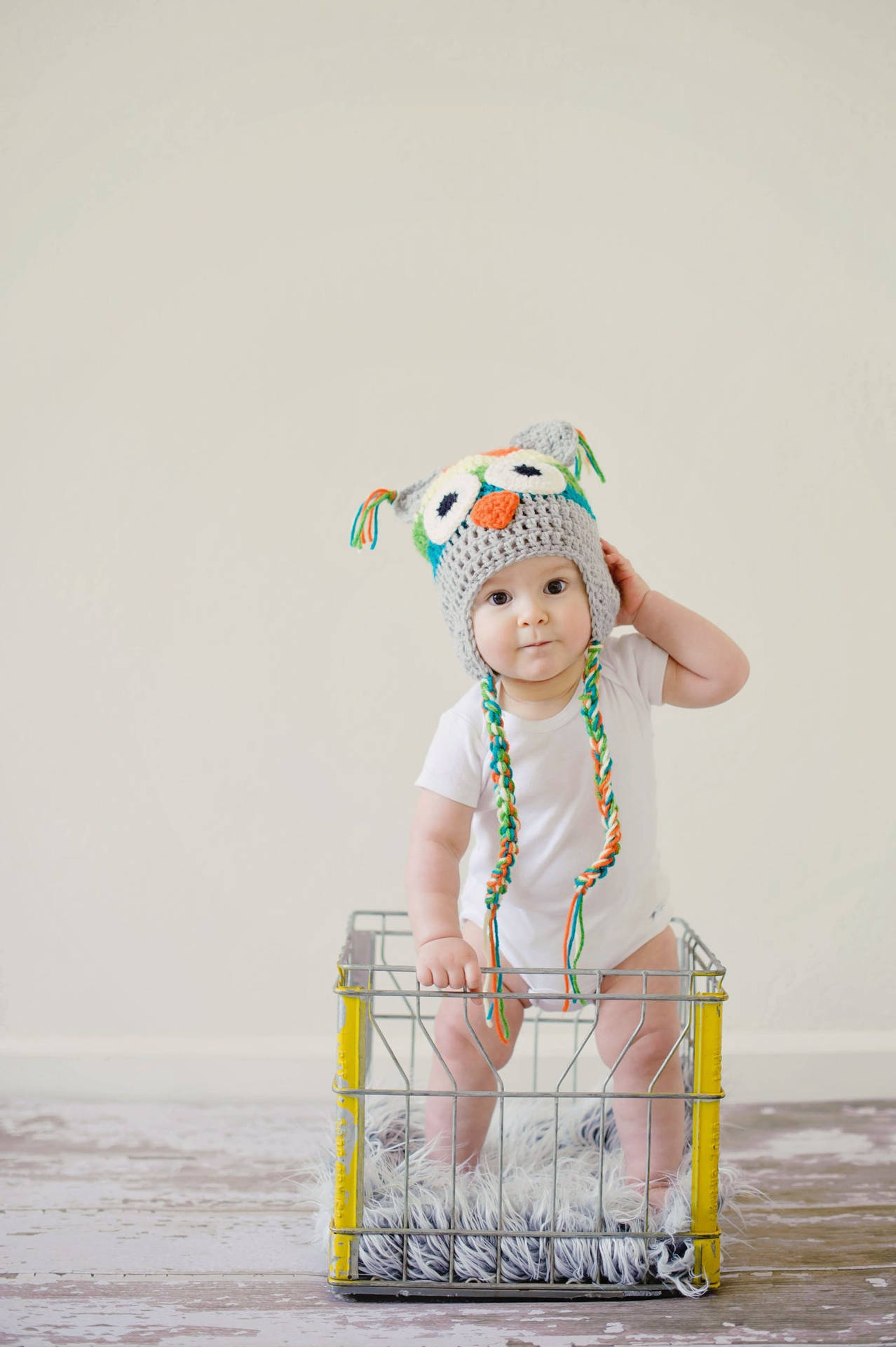 Baby Boy Standing Inside A Basket
