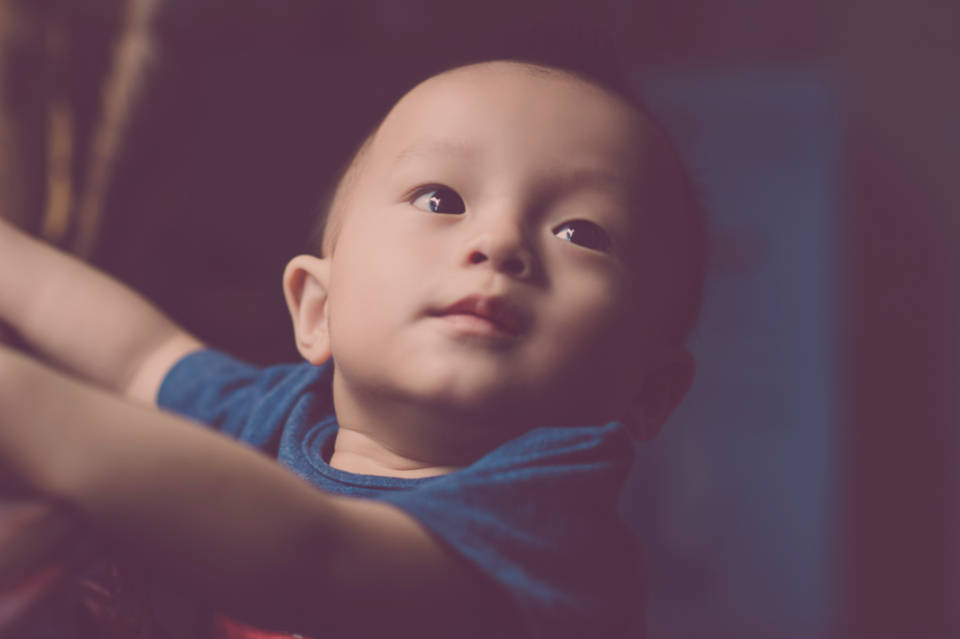 Baby Boy Wearing Dark Blue Shirt Background