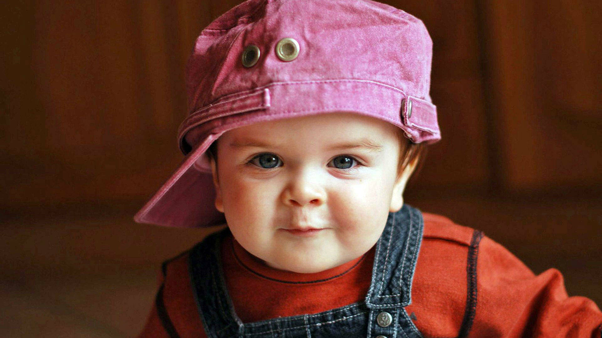 Baby Boy Wearing Pink Hat Background