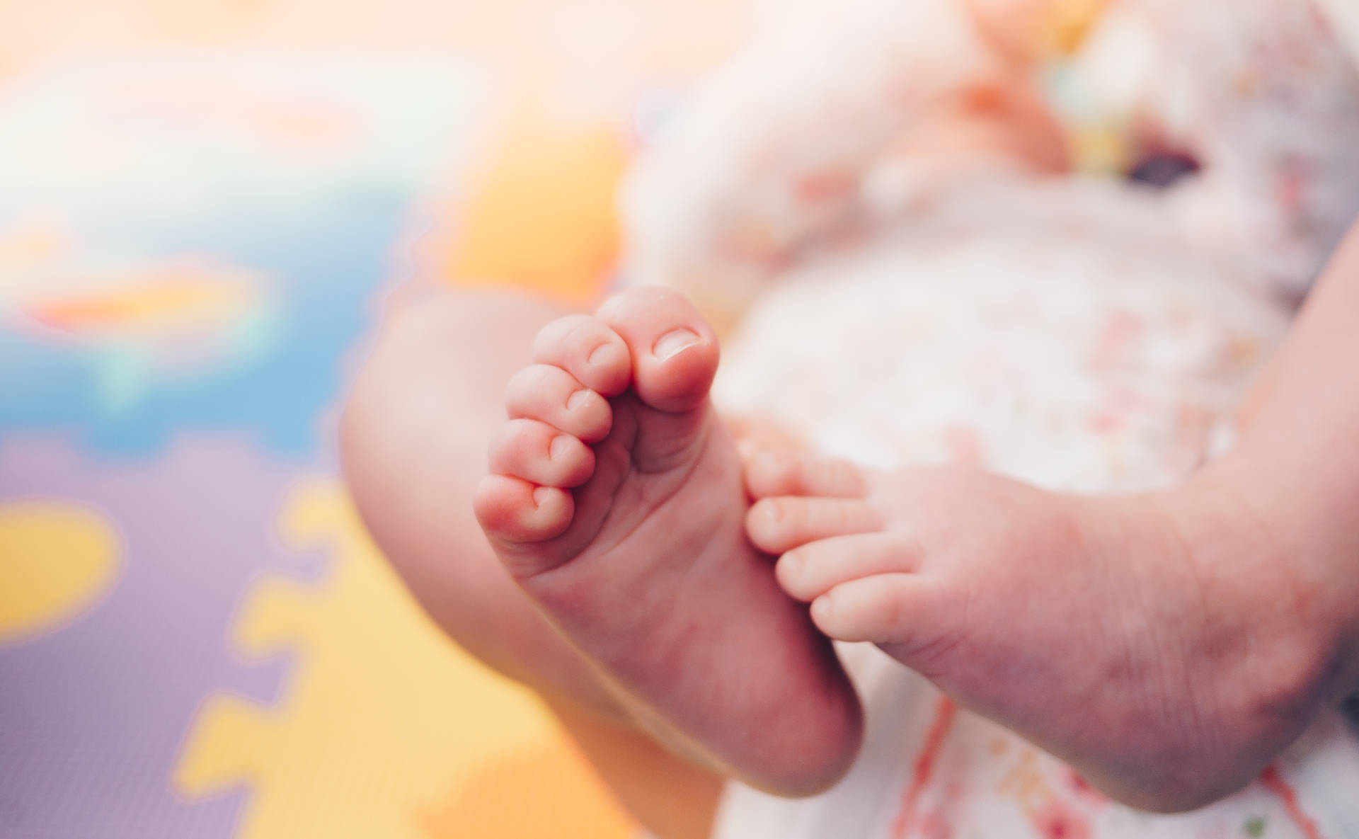 Baby Boy With Little Feet Background