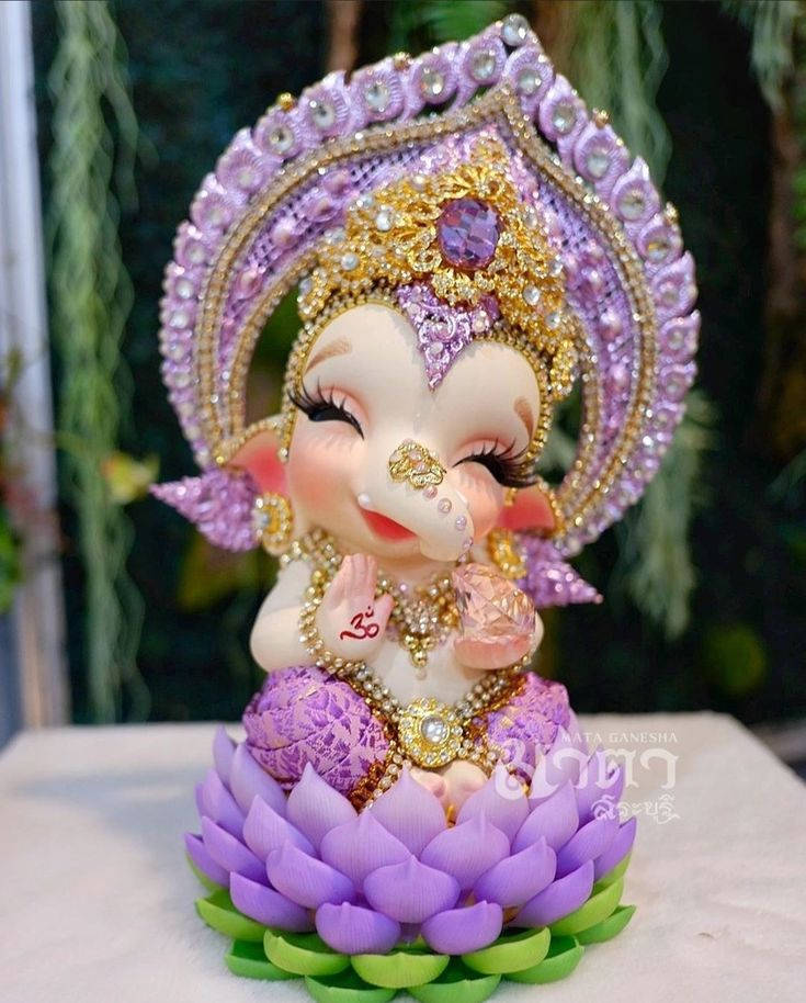 Baby Ganesh Purple Lotus Background