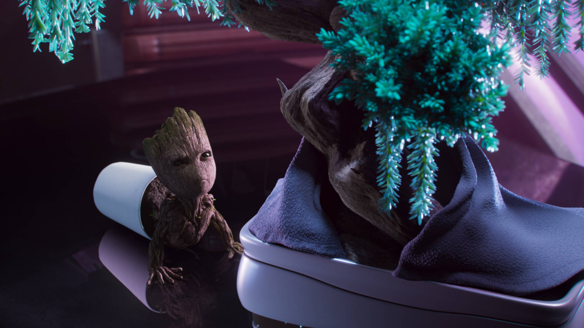 Baby Groot And A Small Tree Plant Background