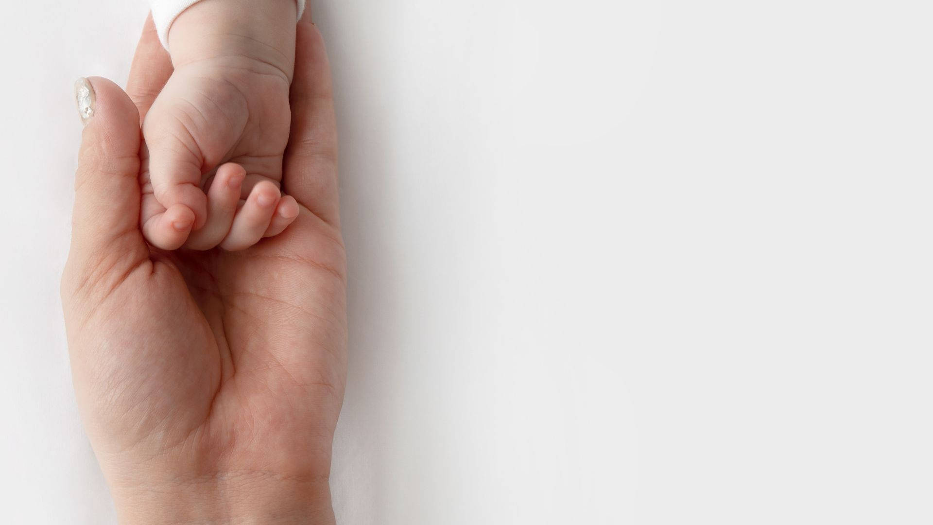 Baby Hand And Mother's Hand Background