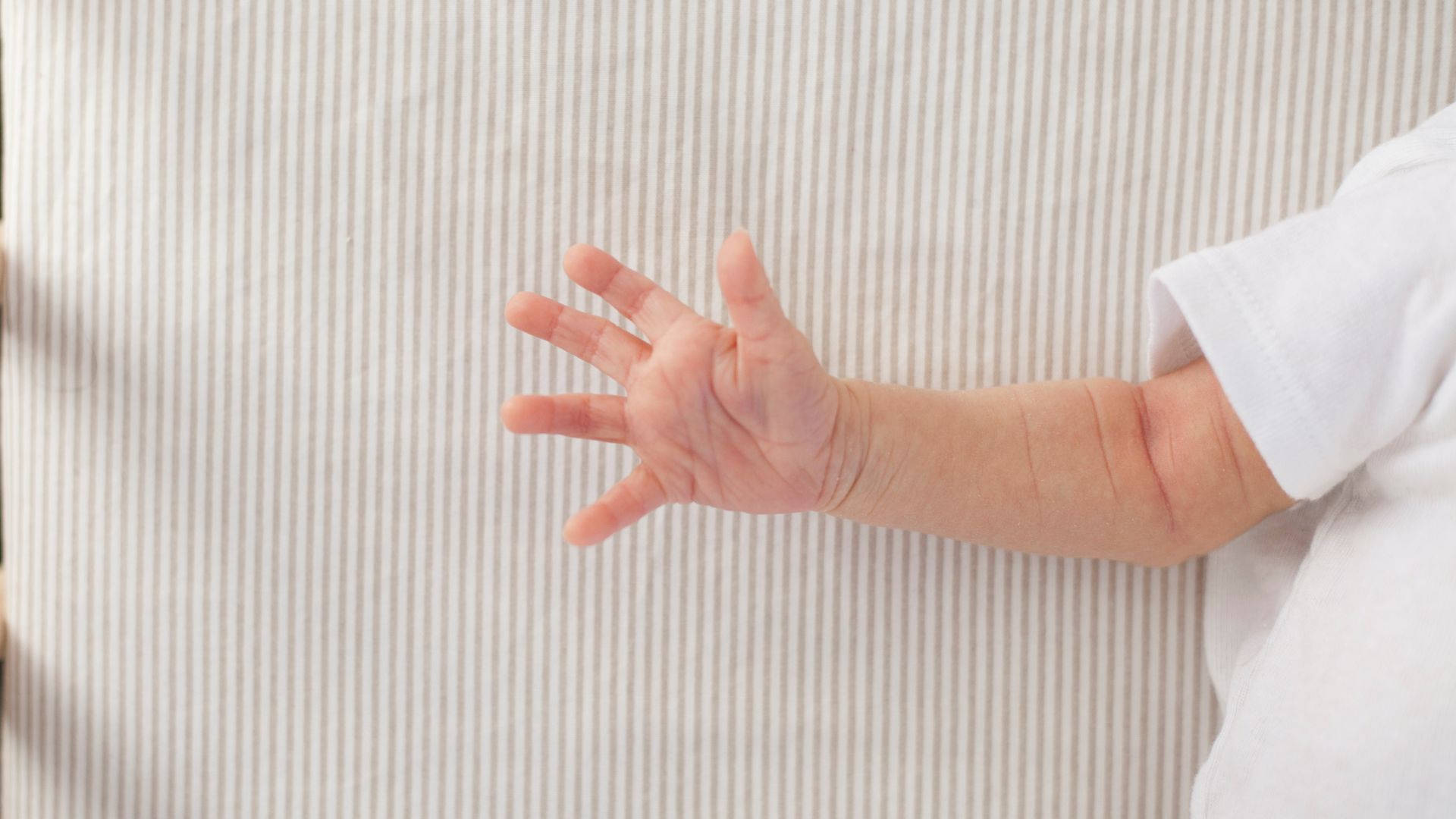 Baby Hand Fingers Stretched Out Background