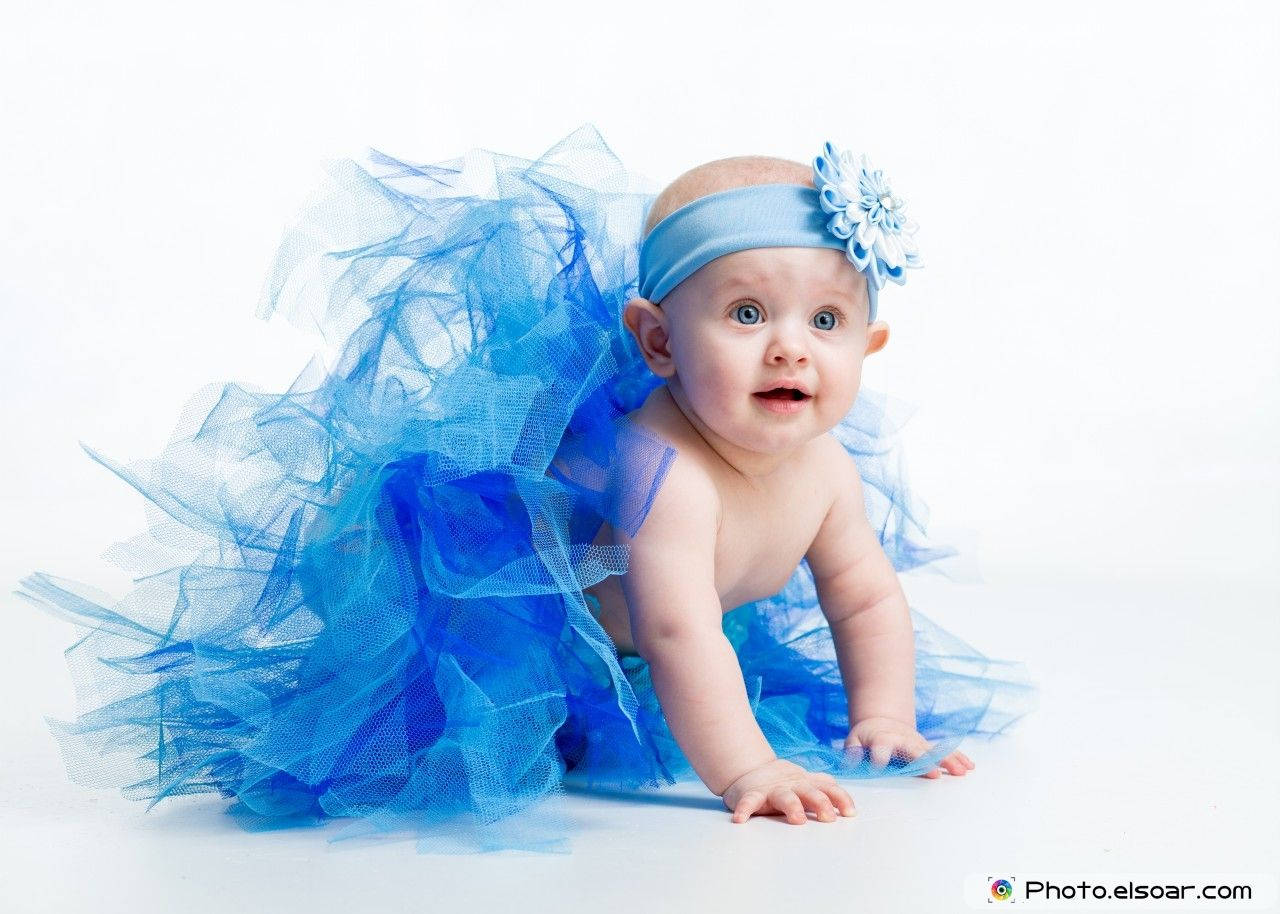 Baby In Blue Gown