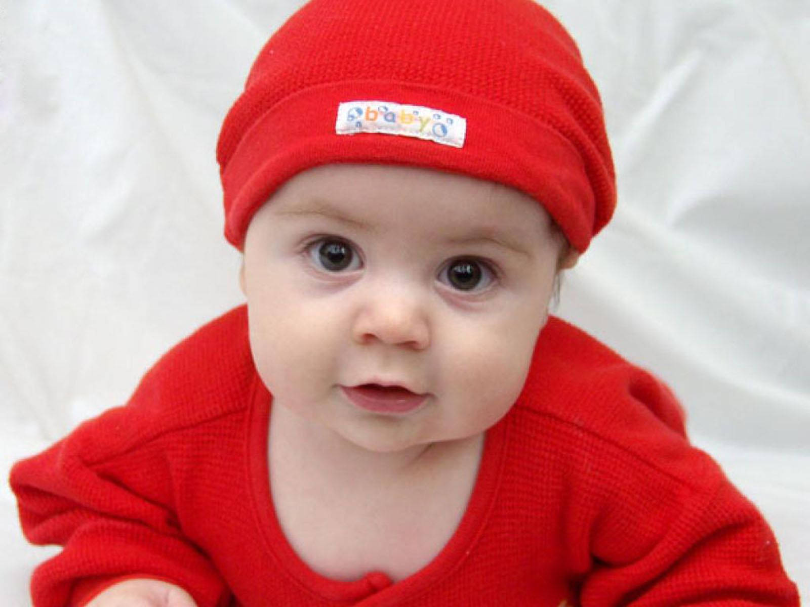 Baby In Red Outfit Is Ready For Playtime
