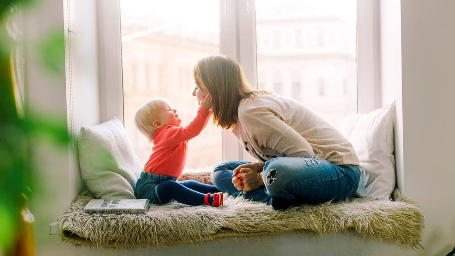 Baby Love Holding Mother's Cheek Background