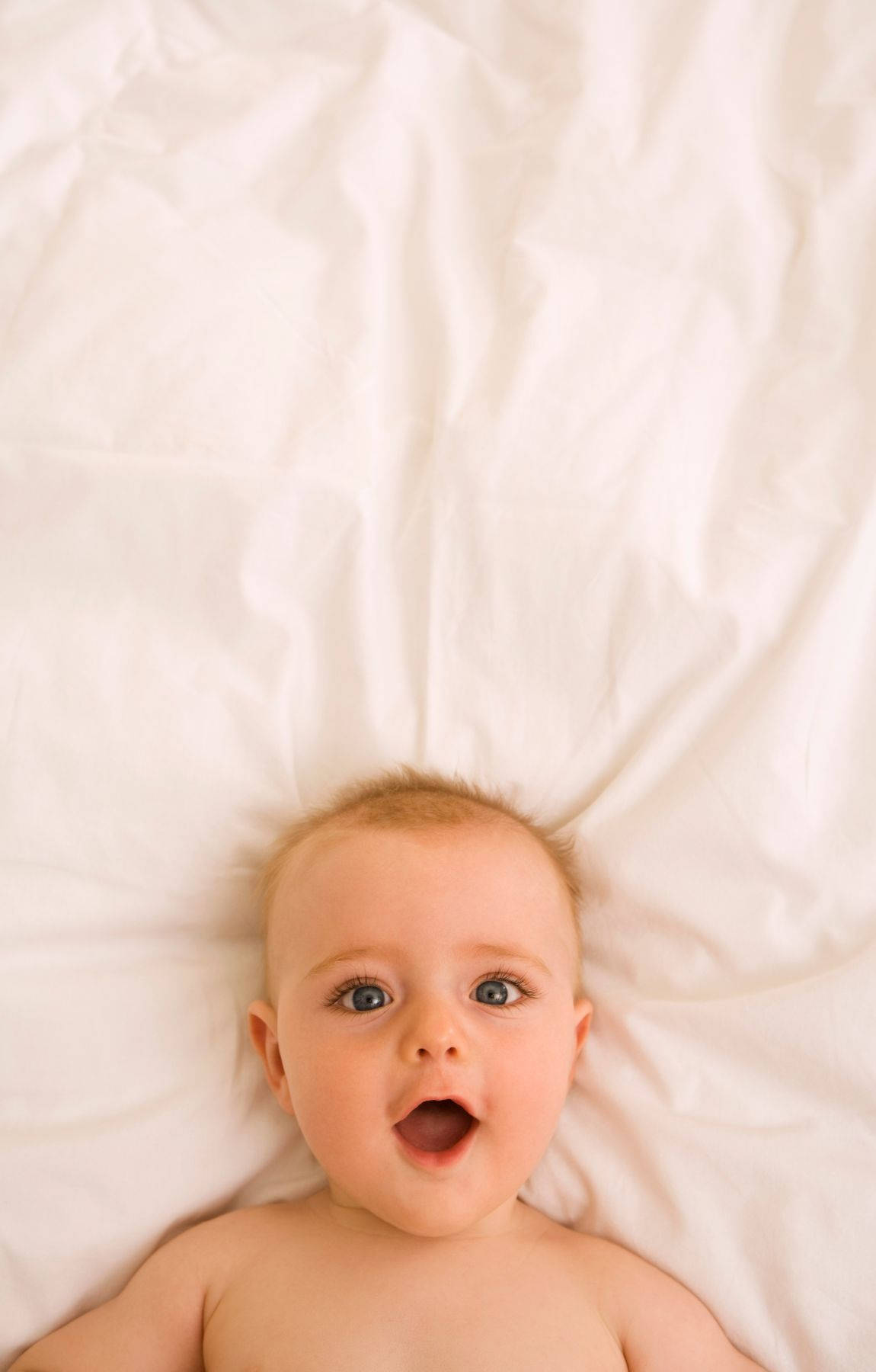 Baby Photography With Surprised Expression Background