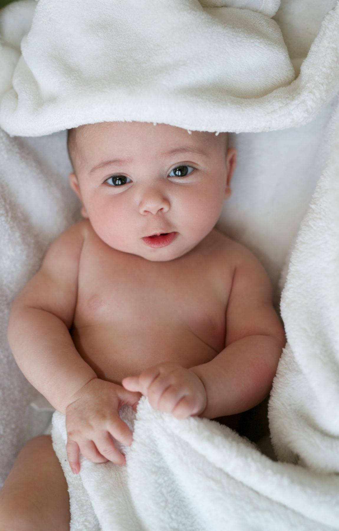 Baby Photography Wrapped In White Towel Background