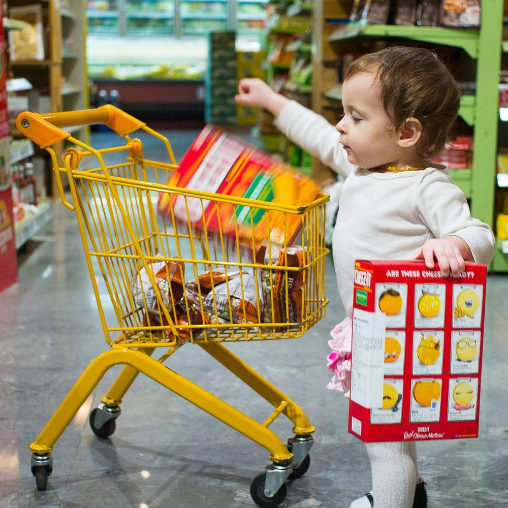 Baby To Purchase Some Cereals Background