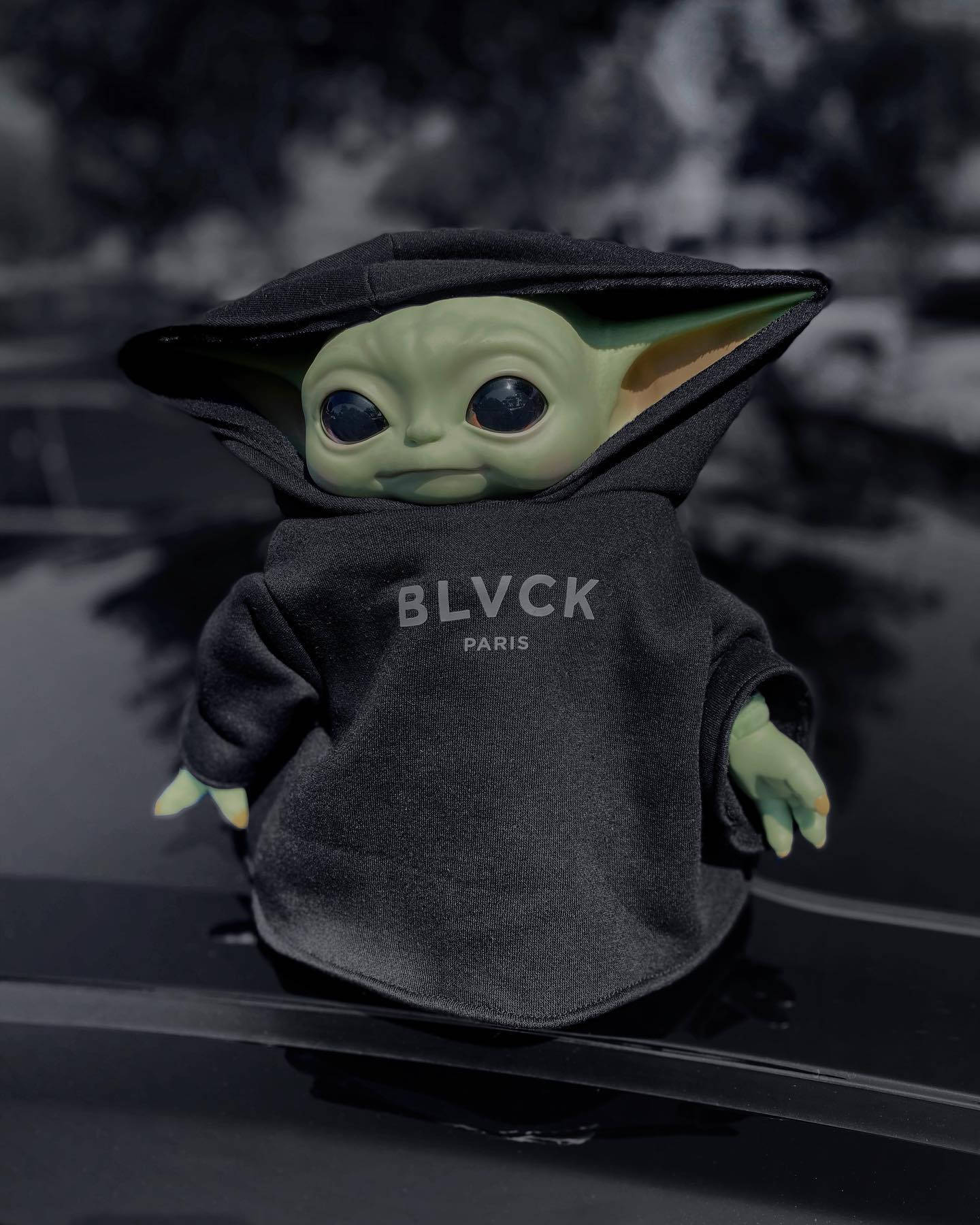 Baby Yoda Wearing Blvck Paris Background